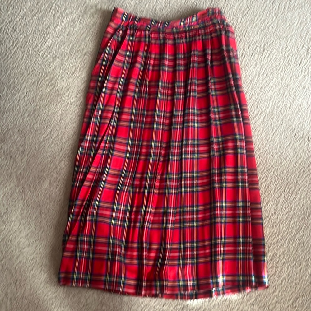 Red plaid skirt. Looks great with a sweater or a blazer!